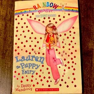 Rainbow Magic: Lauren the Puppy Fairy :by Daisy Meadows